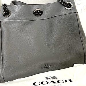 Authentic Coach shoulder bag.  Edie Turnlock Gray